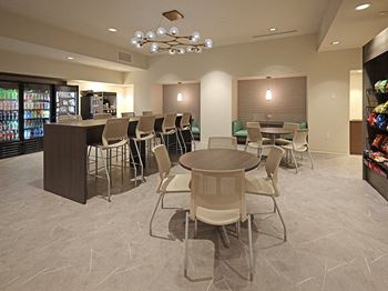 Convenience market with cafe located in the lobby